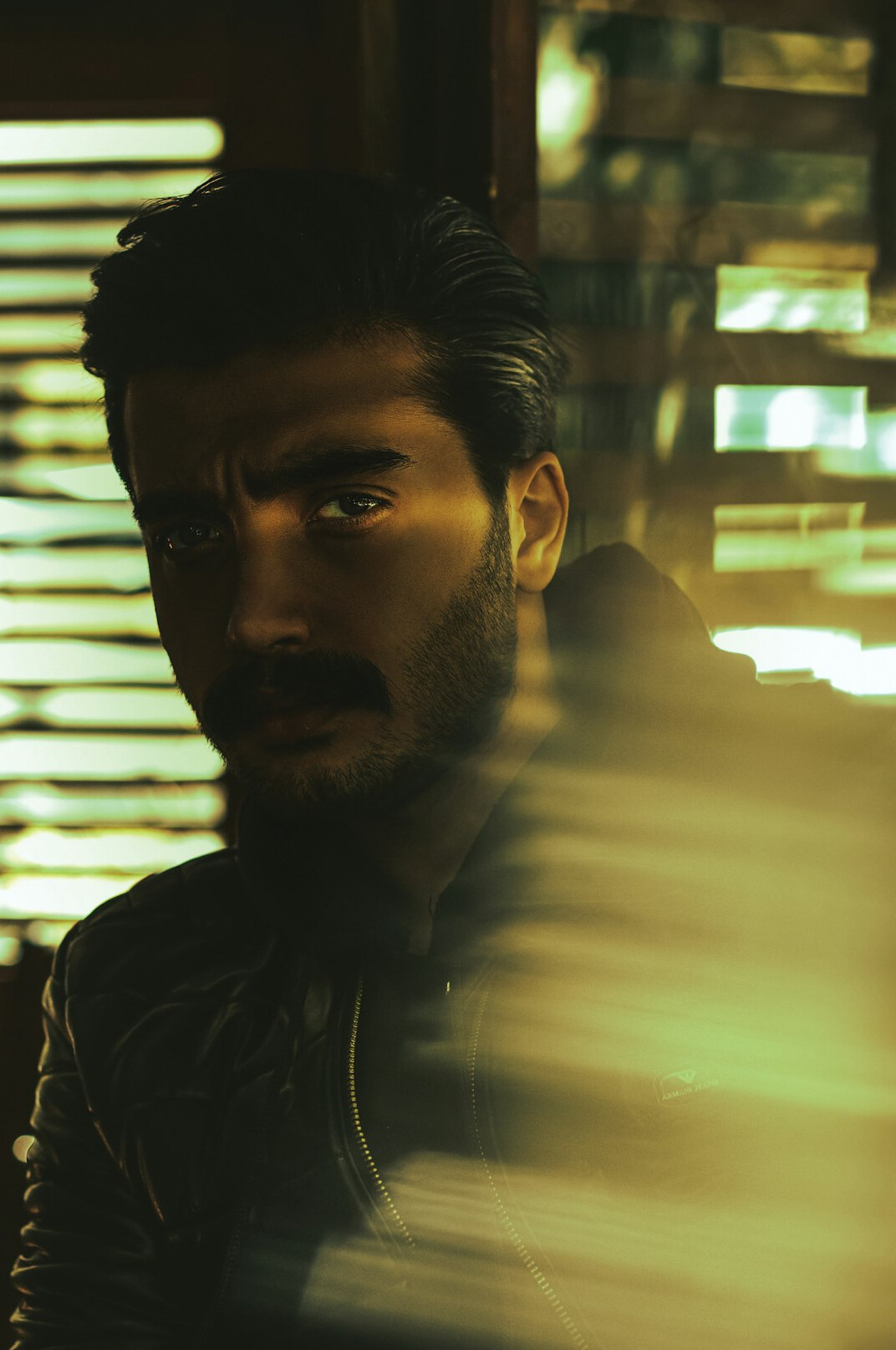 Portrait of a bearded man looking at the camera